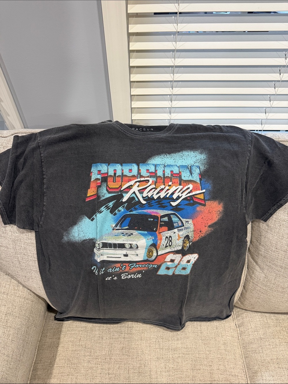 PacSun Black Racing Graphic Tee with Blue and Red Accents